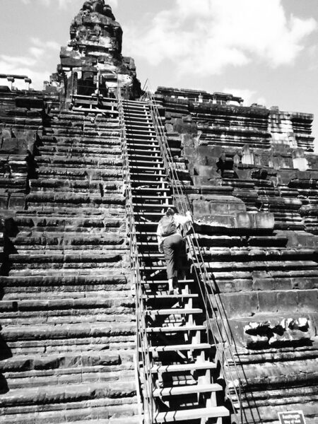 Carol climbing Baphuon